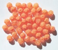 50 6mm Faceted Candy Coated Light Orange Beads
